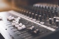 Sound mixer. Professional audio mixing console with lights, buttons Royalty Free Stock Photo