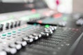 Sound mixer. Professional audio mixing console with lights, buttons, faders and sliders. Royalty Free Stock Photo