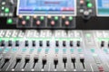 Sound mixer. Professional audio mixing console with lights, buttons, faders and sliders. Royalty Free Stock Photo