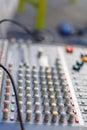 sound mixing board with colorful knobs and sliders Royalty Free Stock Photo