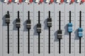 Sound mixing desk faders. Music studio recording equipment volume close-up Royalty Free Stock Photo