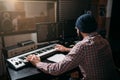 Sound producer work with audio equipment in studio Royalty Free Stock Photo