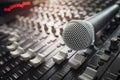 Sound recording studio mixer desk or mixing console and microphone Royalty Free Stock Photo