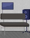 Sound speaker near soft couch. Musical loud speaker sound device in black color, bass equipment Royalty Free Stock Photo