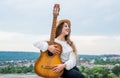 Sound of the streets. talented girl musician. Lifestyle and People Concept. playing the guitar. play on string Royalty Free Stock Photo