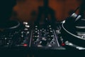 Sound technician control the music. Professional audio, mixer controller panel. Pro equipment for concerts. Selective focus. Dark Royalty Free Stock Photo