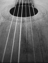 Old acoustic guitar soundhole and strings Royalty Free Stock Photo