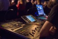 Soundman working on the mixing console. Royalty Free Stock Photo