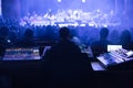 Soundman working on the mixing console. Royalty Free Stock Photo