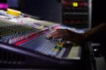 Soundman working on the mixing console. Royalty Free Stock Photo