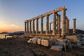 Sounion, Attica / Greece: Colorful sunset at Cape Sounion and the ruins of the temple of Poseidon