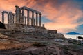 Sounion, Attica - Greece: Colorful sunset at Cape Sounion with the Temple of Poseidon Royalty Free Stock Photo