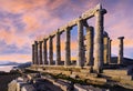 The Temple of Poseidon at cape Sounion. Colorful sunset with beautiful cloudy sky. Royalty Free Stock Photo