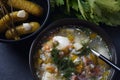 Soup with beef meat, pickled cucumbers and pearl barley. Rassolnik