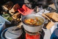 Soup Boiling on burner, cooking food outdoor on gas jet