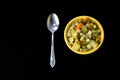 Soup bowl with pasta, beans and vegetables on black background Royalty Free Stock Photo