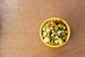 Soup bowl with pasta, beans and vegetables on wood background Royalty Free Stock Photo