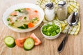 Soup with chicken meat and vegetables, cucumbers, tomato, salt,