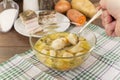 Soup with dumplings and ham Royalty Free Stock Photo