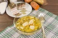 Soup with dumplings and ham Royalty Free Stock Photo