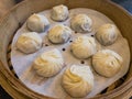 Soup dumplings steamed in bamboo steaming baskets