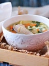 Soup with homemade noodles and organic chicken with carrots, root and leaves of parsley, onion and celery sticks. Royalty Free Stock Photo