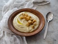 Soup of Jerusalem artichoke and croutons. Vegan cream soup in ceramic bowl. Close up. Copy space.