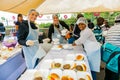 Soup Kitchen community outreach volunteers preparing meals for African children at orphanage