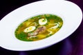 Soup with meat, quail eggs and noodles