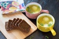 Soup with meatballs in colorful bowl with slices of grain bread Royalty Free Stock Photo