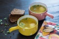 Soup with meatballs in colorful bowl with slices of grain bread Royalty Free Stock Photo