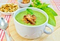 Soup puree with bacon and croutons on fabric Royalty Free Stock Photo