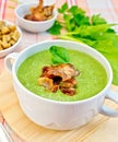 Soup puree with bacon and croutons on tablecloth Royalty Free Stock Photo