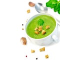 Soup puree with croutons and spoon in bowl Royalty Free Stock Photo