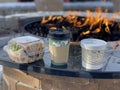 Soup, Sandwich and cup of coffee placed at the side of Fire rink Royalty Free Stock Photo