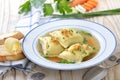 Soup with stuffed ravioli