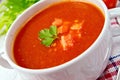 Soup tomato on napkin with parsley Royalty Free Stock Photo