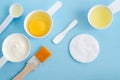 Sour cream or greek yogurt, raw egg and olive oil in a small scoops. Ingredients for preparing diy masks, scrubs, moisturizers. Royalty Free Stock Photo