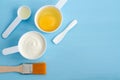 Sour cream or greek yogurt, raw egg and olive oil in a small scoops. Ingredients for preparing diy masks, scrubs, moisturizers. Royalty Free Stock Photo
