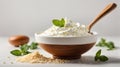 Sour cream in a wooden spoon on a white background. Royalty Free Stock Photo