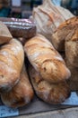 Sour dough bio bread made with natural yeast starter and baked in wood stove on market in France Royalty Free Stock Photo