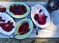 Spoonful of sour Morello cherries on vintage ceramic platter