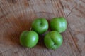 Sour plums a wooden table Royalty Free Stock Photo