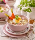 The sour soup ÃÂ»urek, polish Easter soup with the addition of sausage, hard boiled egg and vegetables in a ceramic bowl. Royalty Free Stock Photo