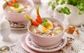 The sour soup ÃÂ»urek, polish Easter soup with the addition of sausage, hard boiled egg and vegetables in a ceramic bowl. Royalty Free Stock Photo