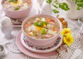 The sour soup ÃÂ»urek, polish Easter soup with the addition of sausage, hard boiled egg and vegetables in a ceramic bowl. Royalty Free Stock Photo