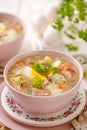 The sour soup ÃÂ»urek, polish Easter soup with the addition of sausage, hard boiled egg and vegetables in a ceramic bowl. Royalty Free Stock Photo