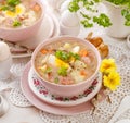 The sour soup ÃÂ»urek, polish Easter soup with the addition of sausage, hard boiled egg and vegetables in a ceramic bowl. Royalty Free Stock Photo