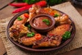 Sour-sweet baked chicken wings Royalty Free Stock Photo