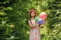 Source of beauty. beautiful girl with party balloons. little girl has fresh blossoming flower of roses in hat. flower Royalty Free Stock Photo